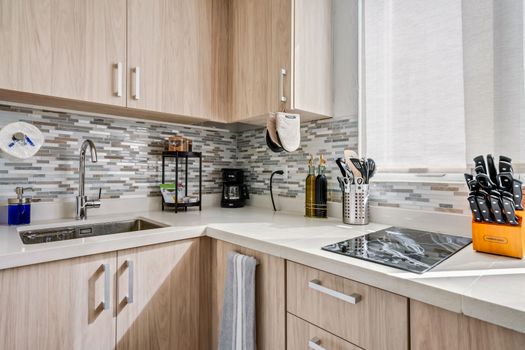 Detail-Oriented Design: Every detail in our kitchen is designed for your comfort and ease, from the neatly organized utensils to the ample prep areas, ensuring a seamless stay.