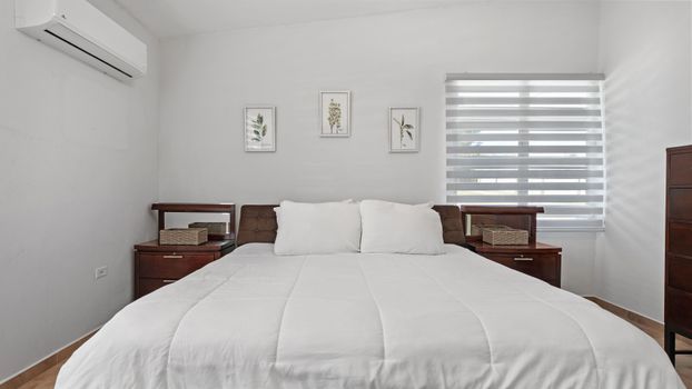 Peaceful slumber: Your comfortable and serene private bedroom.