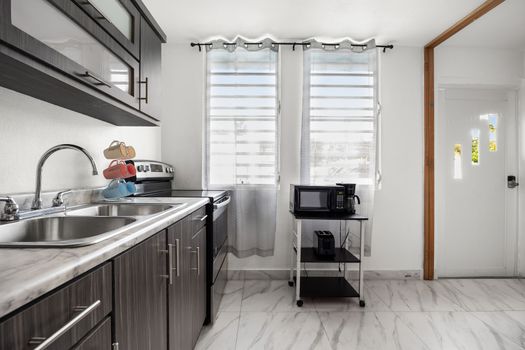 Whip up meals with ease in this well-appointed kitchen.