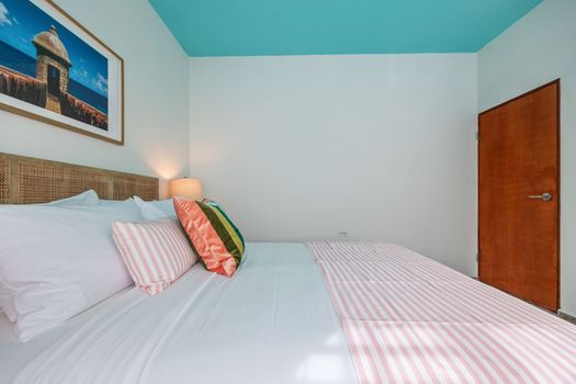 Adorned with charming decor and soft lighting for a restful night.