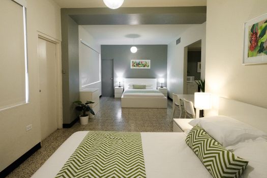 Discover a warm and inviting bedroom perfect for unwinding after a day of exploration. Every detail is crafted to ensure your comfort and satisfaction.