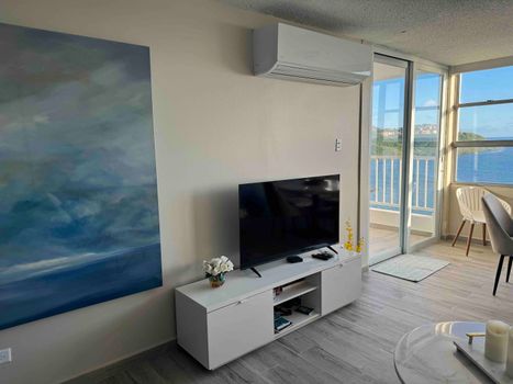 Relax in Style: Unwind in this chic and comfortable living space, perfect for movie nights or quiet evenings after exploring.