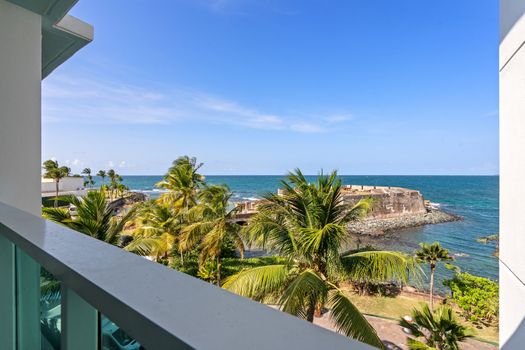 Savor spectacular views of the Caribbean Sea and the historic San Gerónimo Fort from your private vantage point, offering a glimpse into Puerto Rico's rich history.