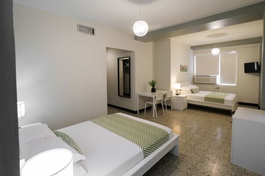 This versatile studio provides both comfort and functionality, featuring a cozy sleeping area and a dedicated dining nook – perfect for meals or catching up on work.