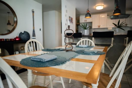 Gather and enjoy meals in our charming dining area, beautifully set for delightful conversations.