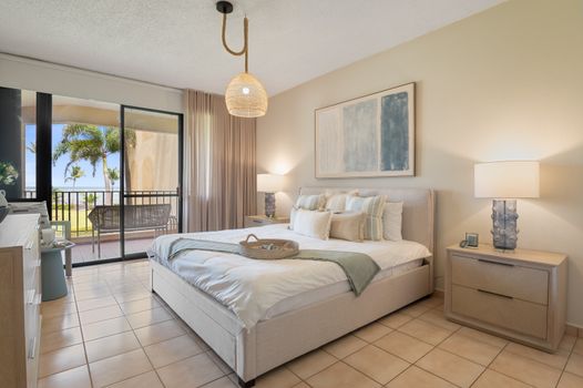 A perfect retreat: unwind in the master bedroom, where comfort meets the beauty of your private outdoor space.