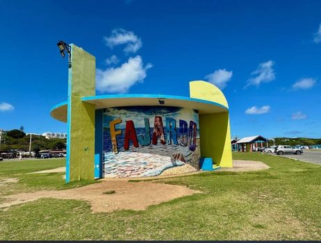 Welcome to Fajardo! Capture your memorable moments with this vibrant, iconic sign set against a beautiful blue sky.