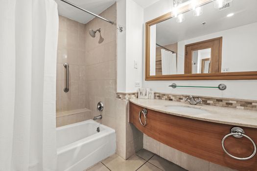 Modern and clean bathroom vanity with elegant details, offering convenience and style.
