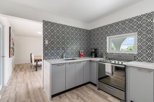 Stylish backsplash and ample counter space for all your culinary needs.