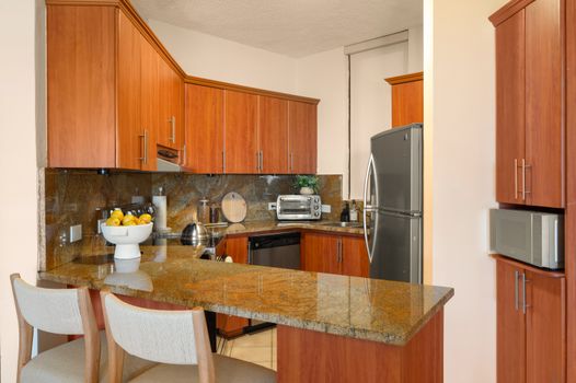 Your fully equipped kitchen, perfect for preparing delicious meals with ample counter space and essential appliances.