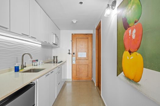 Enjoy the convenience of home-cooked meals with all the essential kitchenware provided for your culinary adventures.