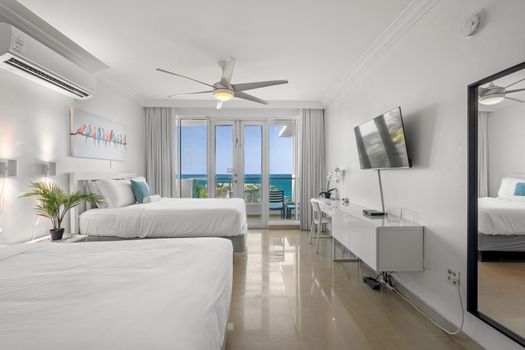 Spacious comfort and stunning ocean views define this charming studio. Direct balcony access creates an inviting atmosphere.