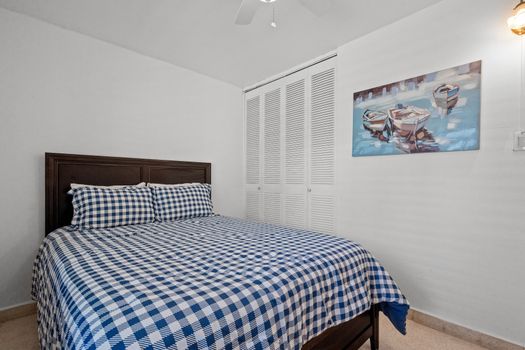 Relaxing Retreat: This beautifully decorated bedroom offers a comfortable bed and a serene ambiance, perfect for a peaceful night's sleep.