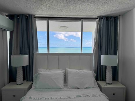 Wake Up to Paradise: Experience serene mornings with stunning ocean views right from the comfort of your luxurious bed.