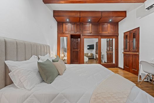 Stylish wooden interiors paired with modern amenities create the perfect blend of elegance and comfort for your stay.