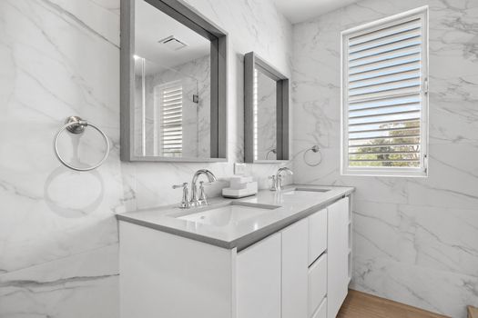 Modern design with beautiful wood-look shower tiles.