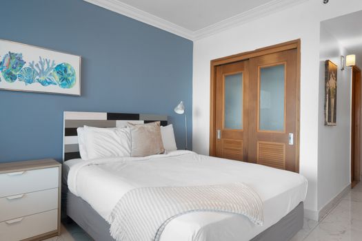 Rest easy in your cozy haven. Comfortable queen bed & thoughtful design ensure a peaceful night's sleep.