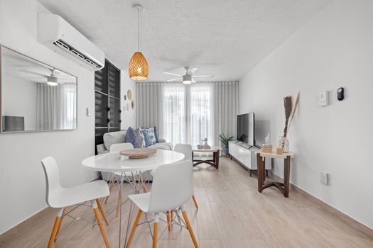 Enjoy your morning coffee in this sun-drenched, contemporary kitchen.