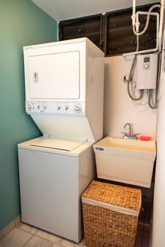 No need to overpack! Our dedicated laundry area with a washer, dryer, and utility sink provides ultimate practicality for your comfort throughout your stay.