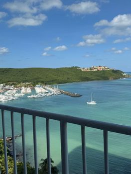 Breezy Balcony, Nautical Charm: This outdoor space offers a perfect vantage point to watch the boats drift by in the marina.