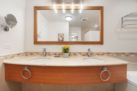 Enjoy the convenience of a generously sized bathroom, perfect for getting ready or unwinding after a day out.