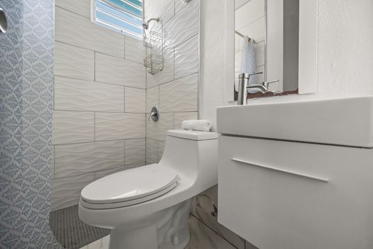 Spotless bathroom, ready for your use.