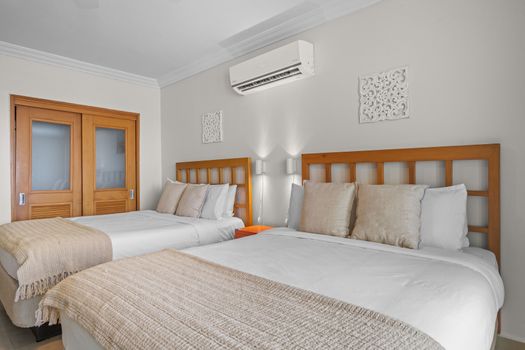 Your comfortable retreat: a beautifully decorated bedroom combining functionality with a breathtaking backdrop.