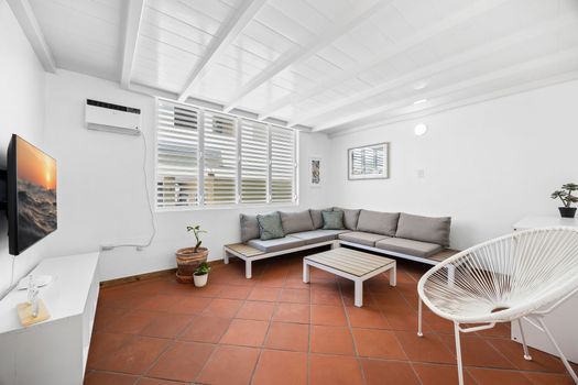 Cozy Living Room with Style. Enjoy the comfort of a sectional sofa and the charm of this inviting living space.