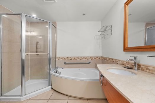 Indulge in relaxation with our luxurious corner soaking tub, perfect for unwinding after a day of exploring San Juan. It's your private spa retreat.