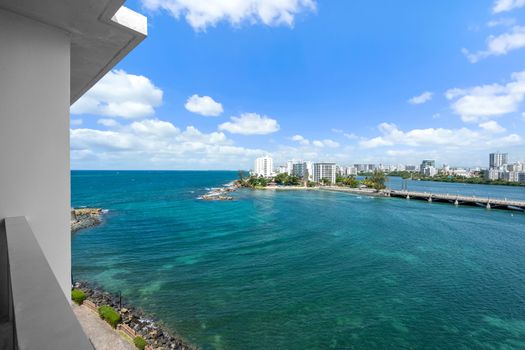 Witness the charm of the city's infrastructure blending seamlessly with the natural beauty of the waterfront, an iconic scene right from your window.