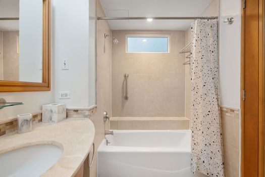 Your private oasis! This bathroom offers a tranquil setting for a refreshing shower or a relaxing soak.