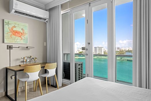 Enjoy unparalleled water views from your private balcony, offering a constant refreshing breeze and a picturesque backdrop for your stay.