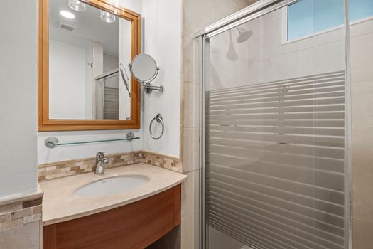 Refreshed and ready! Enjoy a clean and contemporary bathroom with a convenient, accessible shower.