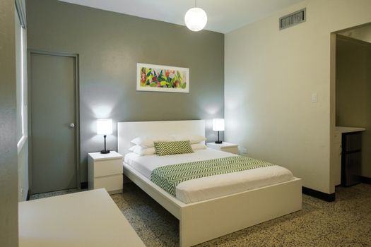 Sink into the luxurious comfort of our bed, adorned with soft pillows and crisp linens, guaranteeing you a peaceful and rejuvenating night's sleep.