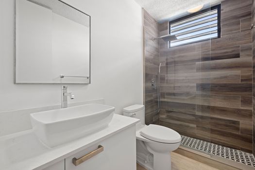 Sink into comfort and style in our immaculate washroom retreat.