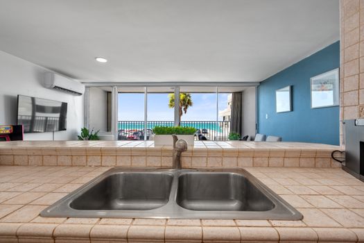 Modern, minimalist interior with bright colors reflecting the tropical surroundings.