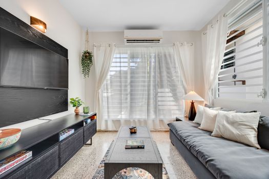 Sink into the comfortable sofa and enjoy a moment of peace.