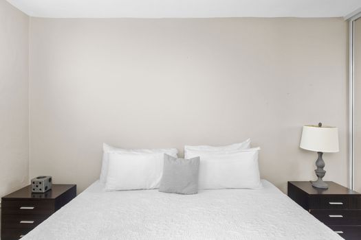 Chic and simple - a bedroom that balances comfort with style, offering a restful night's sleep.