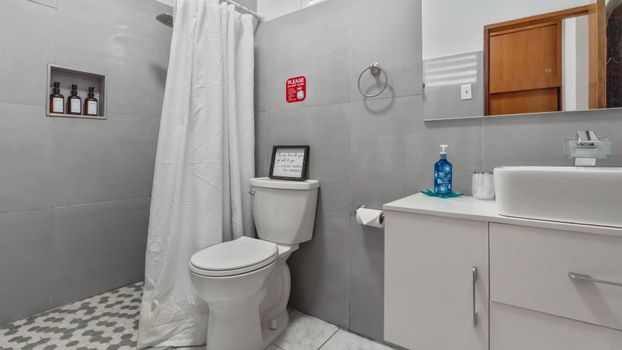 Bright and functional: Stylish bathroom for your convenience.