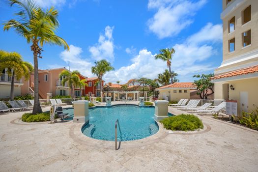 Create unforgettable memories with your loved ones in our tropical pool setting.