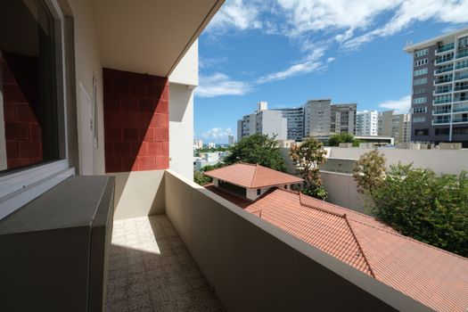 Private Balcony View. Enjoy fresh air and the urban vista of San Juan.
