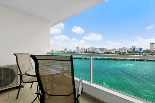 Entrance of balcony revealing a glimpse of your comfortable and well-equipped space.