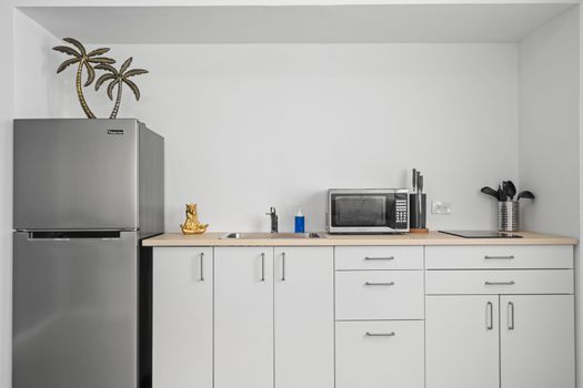 A modern kitchenette for your cozy stay.