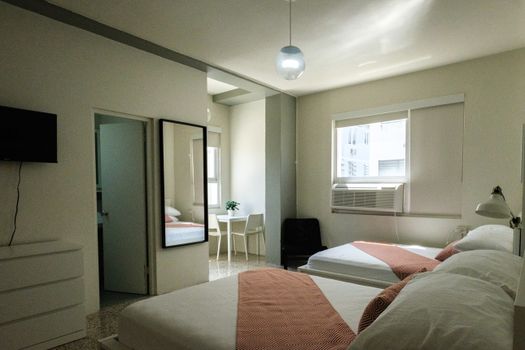 "Experience a versatile living space flooded with natural light, featuring comfortable sleeping arrangements and ample room to relax and make yourself at home.