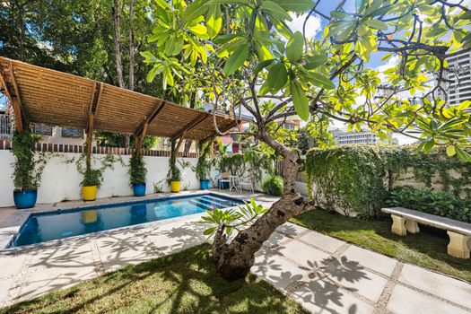 Escape to your own slice of paradise – a stunning outdoor area perfect for sunbathing and unwinding.