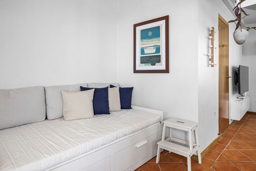Extra space to lounge or sleep. This comfy nook is great for relaxing—or a bonus bed for extra guests.