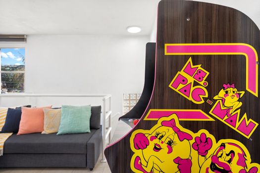 Level up your living room with a PAC-MAN arcade game.
