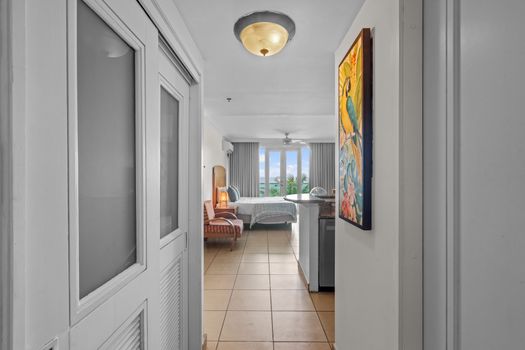Sleep with a view. Enjoy unparalleled lagoon and ocean panoramas right from your bed, complemented by modern comforts like AC and a ceiling fan for a perfect night's rest.