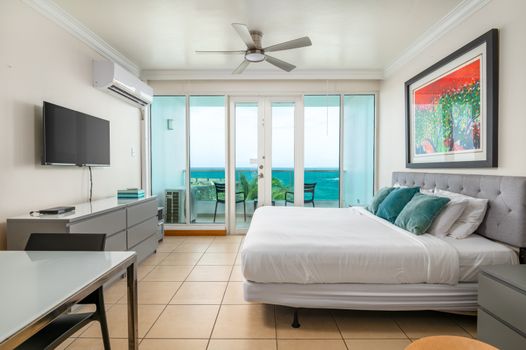Wake up to the sound of waves! Luxurious King bed facing direct ocean views and private balcony access.