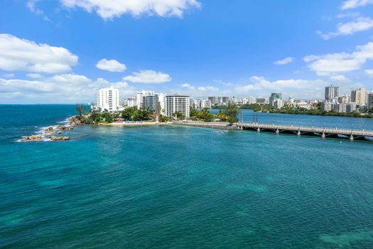 Marvel at the architectural beauty of the bridge stretching across the tranquil lagoon, connecting you to the bustling city beyond.